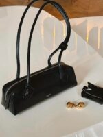 The Alaïa Noir Élégance Shoulder Bag - Image 6